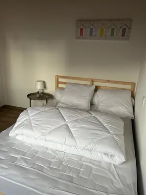 Un ou plusieurs lits dans un hébergement de l'établissement Maison proche de la mer