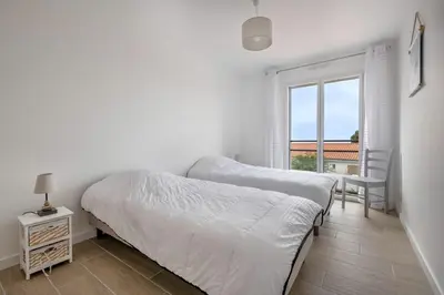 Un ou plusieurs lits dans un hébergement de l'établissement Maison récente à Pornic 500m de la plage pour 5