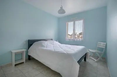 Un ou plusieurs lits dans un hébergement de l'établissement Maison au calme à 400m de la plage