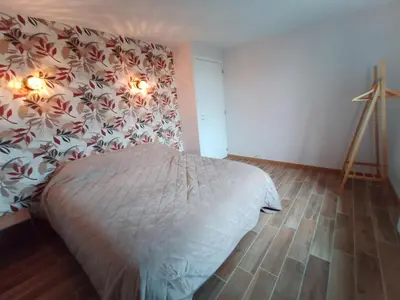 Un ou plusieurs lits dans un hébergement de l'établissement Maison a la Laiterie