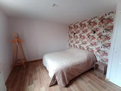 Un ou plusieurs lits dans un hébergement de l'établissement Maison a la Laiterie
