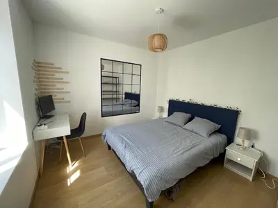 Un ou plusieurs lits dans un hébergement de l'établissement Maison indépendante au calme - 1ch