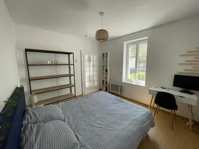 Un ou plusieurs lits dans un hébergement de l'établissement Maison indépendante au calme - 1ch