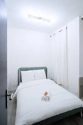 Un ou plusieurs lits dans un hébergement de l'établissement La loge des Carmélites Coeur de Nantes WIFI
