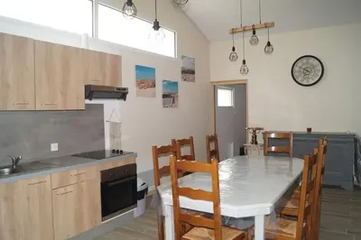 Cuisine ou kitchenette dans l'établissement Maison de vacances saisonnier