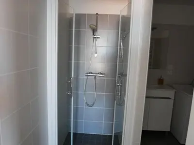 Salle de bains dans l'établissement La perle océane de St Gilles