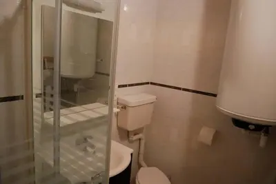 Salle de bains dans l'établissement La Petite maison de pays