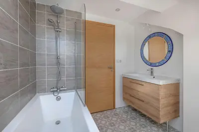 Salle de bains dans l'établissement 500m Plage des Libraires - Maison 4 chambres