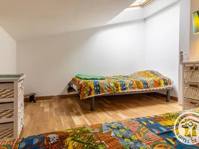 Un ou plusieurs lits dans un hébergement de l'établissement Gîte confortable 2 chambres avec jardin, animaux admis, Wifi, parking - FR-1-622-80