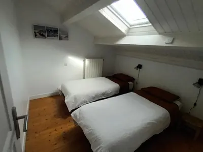 Un ou plusieurs lits dans un hébergement de l'établissement Gîte 80 m2 au calme et 20 mn de la mer