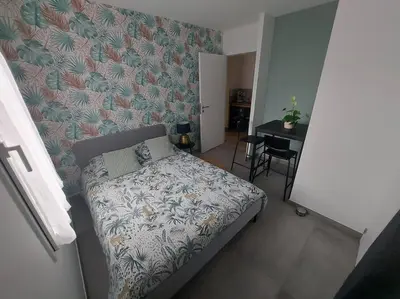 Un ou plusieurs lits dans un hébergement de l'établissement Studio 2 chambres chez particulier, avec entrée indépendante, proche du Puy Fou, encas du matin offert