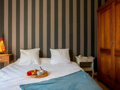 Un ou plusieurs lits dans un hébergement de l'établissement Holiday Home La Goélette by Interhome
