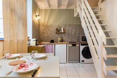 Cuisine ou kitchenette dans l'établissement Duplex industriel sur l'île de Nantes