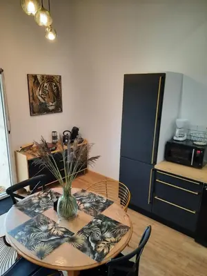 Cuisine ou kitchenette dans l'établissement gîte grange le Kulmino