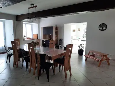 Coin salon dans l'établissement Gîte à la ferme - le Boupère