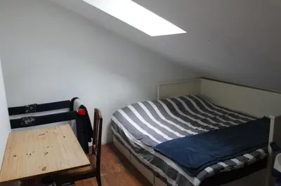 Un ou plusieurs lits dans un hébergement de l'établissement Maison bourg