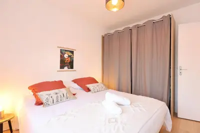 Un ou plusieurs lits dans un hébergement de l'établissement La Petite Maison