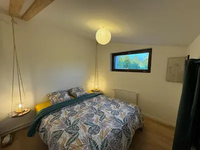 Un ou plusieurs lits dans un hébergement de l'établissement Gîte du Séquoia - Paisible maison de campagne