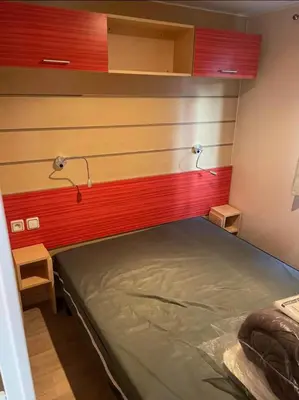 Un ou plusieurs lits dans un hébergement de l'établissement Mobil home 6 personnes sur camping