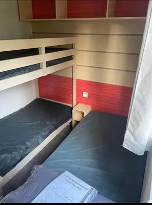 Un ou plusieurs lits dans un hébergement de l'établissement Mobil home 6 personnes sur camping