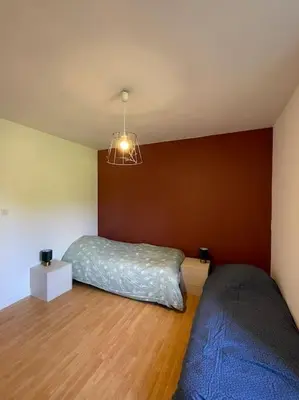 Un ou plusieurs lits dans un hébergement de l'établissement Maison du domaine de Val Léose
