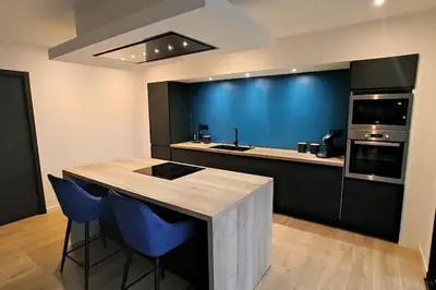 Cuisine ou kitchenette dans l'établissement Le Refuge des Artistes