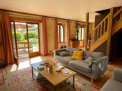 Coin salon dans l'établissement Maison avec jardin - L'Orangerie