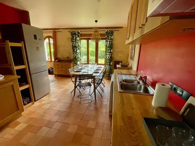 Cuisine ou kitchenette dans l'établissement Maison avec jardin - L'Orangerie