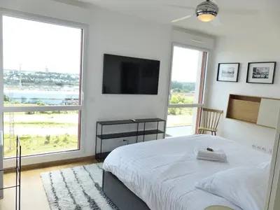 Un ou plusieurs lits dans un hébergement de l'établissement Le Belvédère - Appartement de standing, 2 chambres et parking