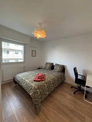 Un ou plusieurs lits dans un hébergement de l'établissement Apartment Nantes Erdre - 3 bedrooms, Parc des Expositions