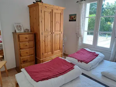 Un ou plusieurs lits dans un hébergement de l'établissement Belle villa avec piscine dans quartier calme à Saint-Jean-de-Monts - FR-1-323-542