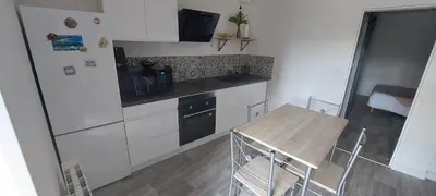 Cuisine ou kitchenette dans l'établissement La Marina