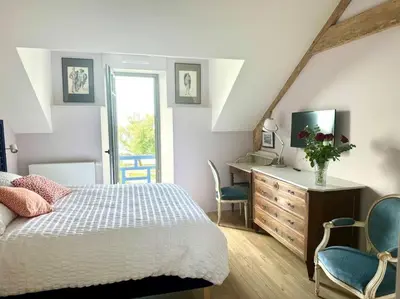Un ou plusieurs lits dans un hébergement de l'établissement Face Mer Villa Le Ker Breton