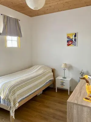 Un ou plusieurs lits dans un hébergement de l'établissement Maison pêcheur centre Saint Gilles Croix de Vie avec ménage et draps inclus