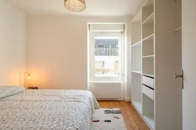 Un ou plusieurs lits dans un hébergement de l'établissement T2 cosy à deux pas de la gare