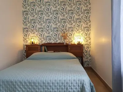 Un ou plusieurs lits dans un hébergement de l'établissement Gîte à Saint André des Eaux