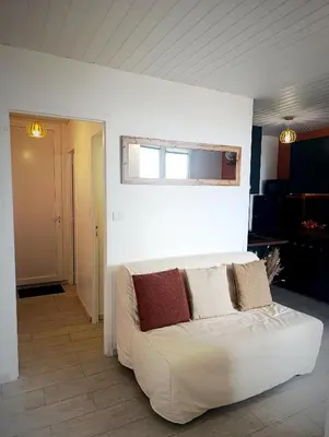 Un ou plusieurs lits dans un hébergement de l'établissement Appartement face mer 4 personnes linge de maison sur demande
