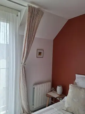 Un ou plusieurs lits dans un hébergement de l'établissement Saint Jo Verte, chambre d' hôte Quartier Beaujoire Parc des expositions Parc Floral