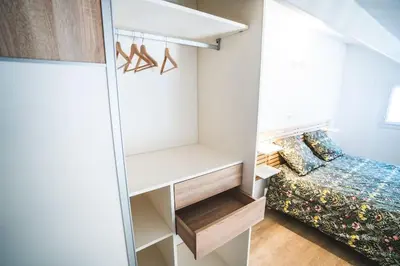 Un ou plusieurs lits dans un hébergement de l'établissement Maison L oree du Golf