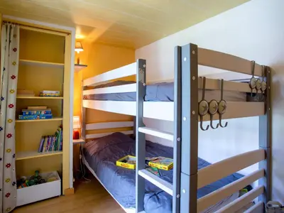 Un ou plusieurs lits superposés dans un hébergement de l'établissement Holiday Home L'Adalou by Interhome