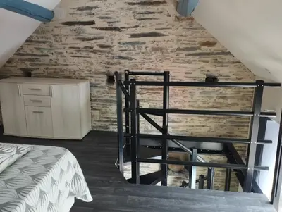 Un ou plusieurs lits dans un hébergement de l'établissement Maison de charme avec piscine en partage
