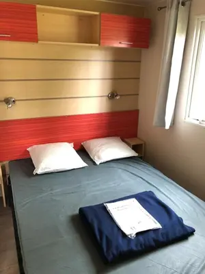 Un ou plusieurs lits dans un hébergement de l'établissement Bungalow 