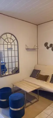 Coin salon dans l'établissement Le gîte Bleu