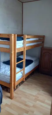 Un ou plusieurs lits dans un hébergement de l'établissement Le gîte Bleu