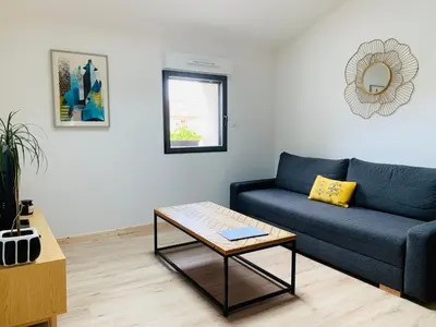 Coin salon dans l'établissement Le Solier, gîte à la campagne