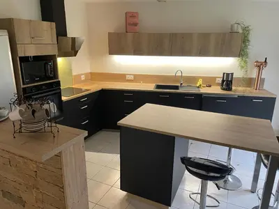 Cuisine ou kitchenette dans l'établissement Maison aux volets bleus