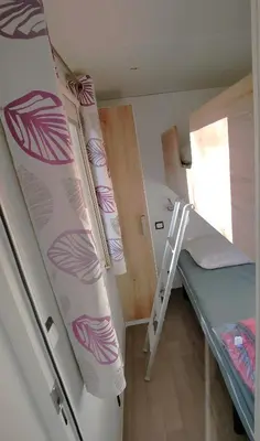 Un ou plusieurs lits dans un hébergement de l'établissement mobil home moderne et spacieux