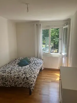 Un ou plusieurs lits dans un hébergement de l'établissement Appartement Nantes Parc des expositions La Beaujoire