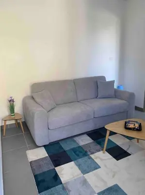Coin salon dans l'établissement L'appartement des tortues