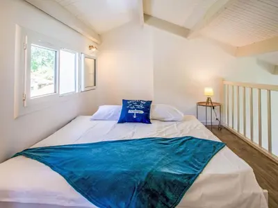 Un ou plusieurs lits dans un hébergement de l'établissement Holiday Home Les Pins by Interhome
